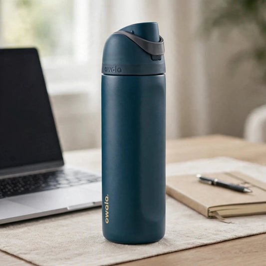 Owala FreeSip Stainless Steel Water Bottle - desk