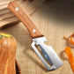 Stainless steel peeler with wooden handle