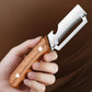 Stainless steel peeler with wooden handle
