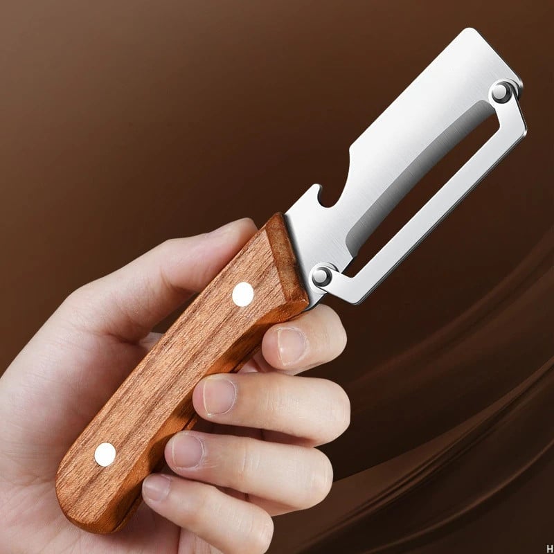 Stainless steel peeler with wooden handle