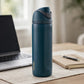 Owala FreeSip Stainless Steel Water Bottle - desk