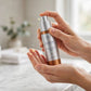 Alastin C-Radical Defense Antioxidant Serum 29.6ml — hand applying the product