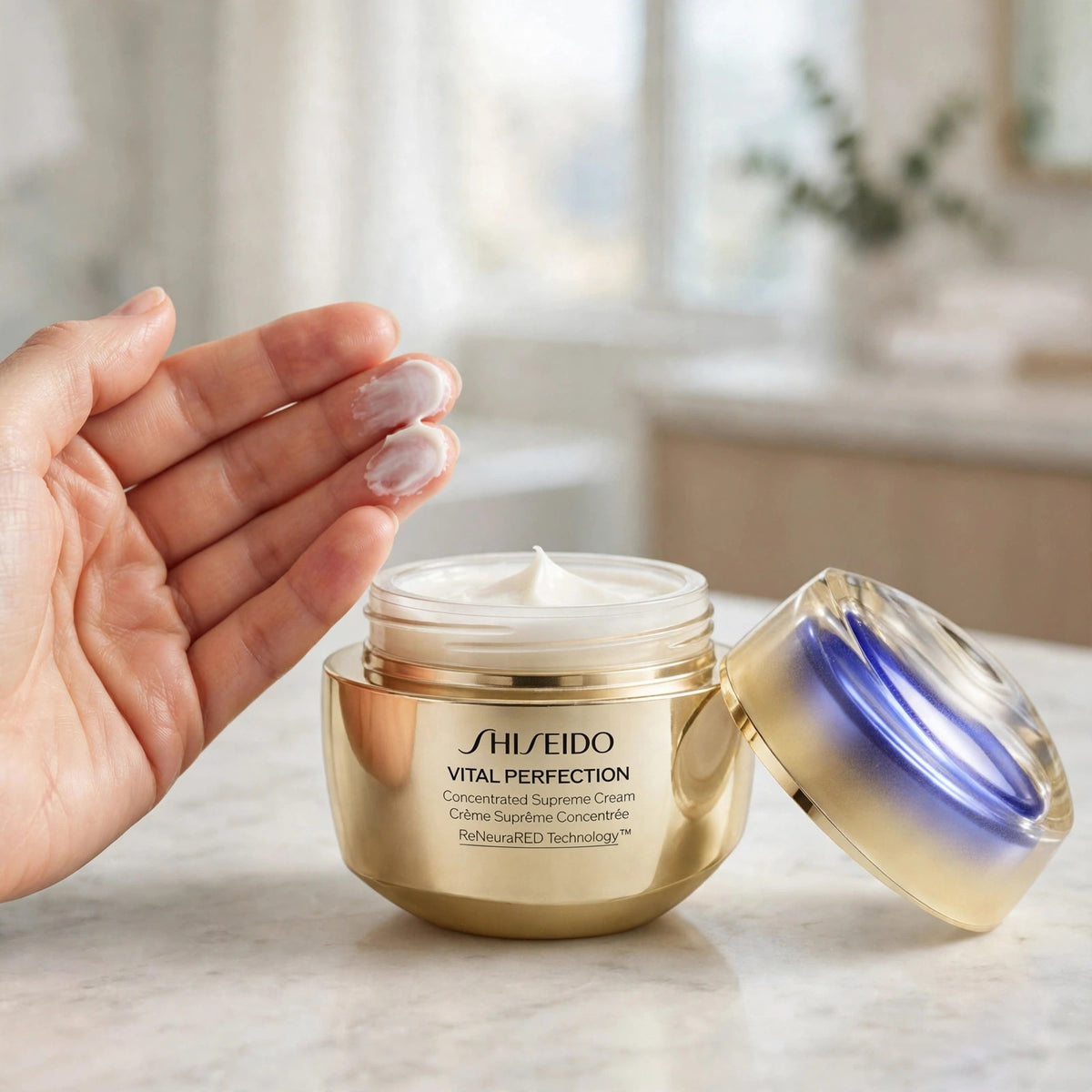 How to use: Shiseido Vital Perfection Concentrated Supreme Cream with cream on fingertips
