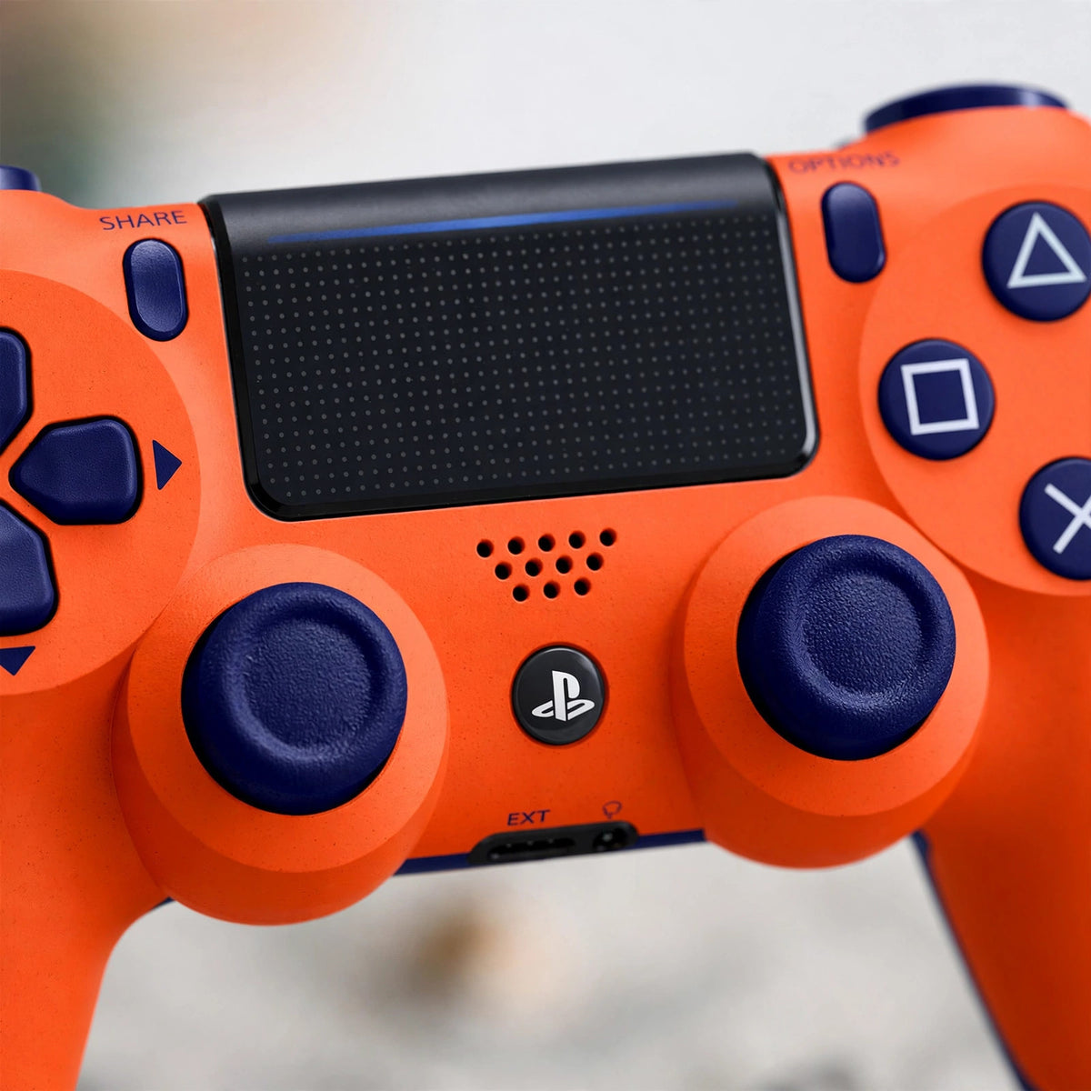 DualShock 4 Wireless Controller for PlayStation 4 - Sunset Orange - macro