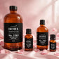 Hotel Collection Aroma 360 Essential Oil 500ml — product on blush-pink satin with rose petals