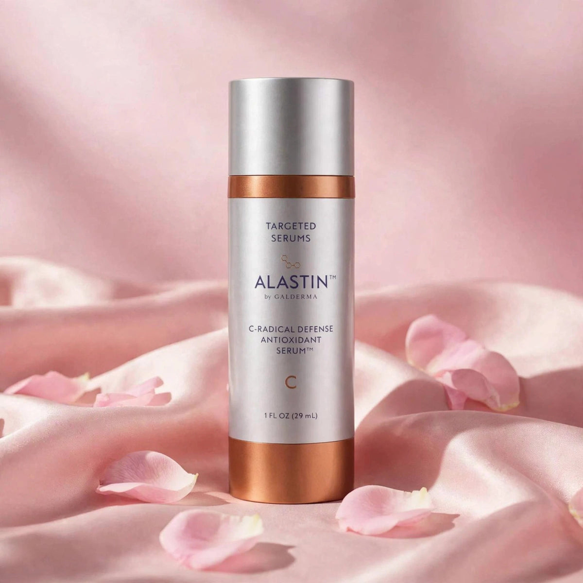Alastin C-Radical Defense Antioxidant Serum 29.6ml — product on blush-pink satin with rose petals