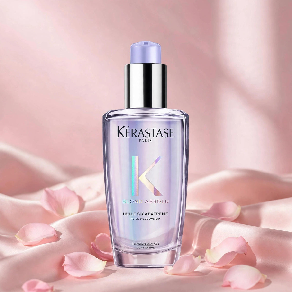 Kérastase Blond Absolu Huile Cicaextreme 100ml — product on blush-pink satin with rose petals