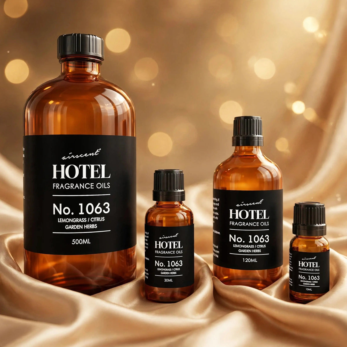 Hotel Collection Aroma 360 Essential Oil 500ml — product on champagne silk fabric