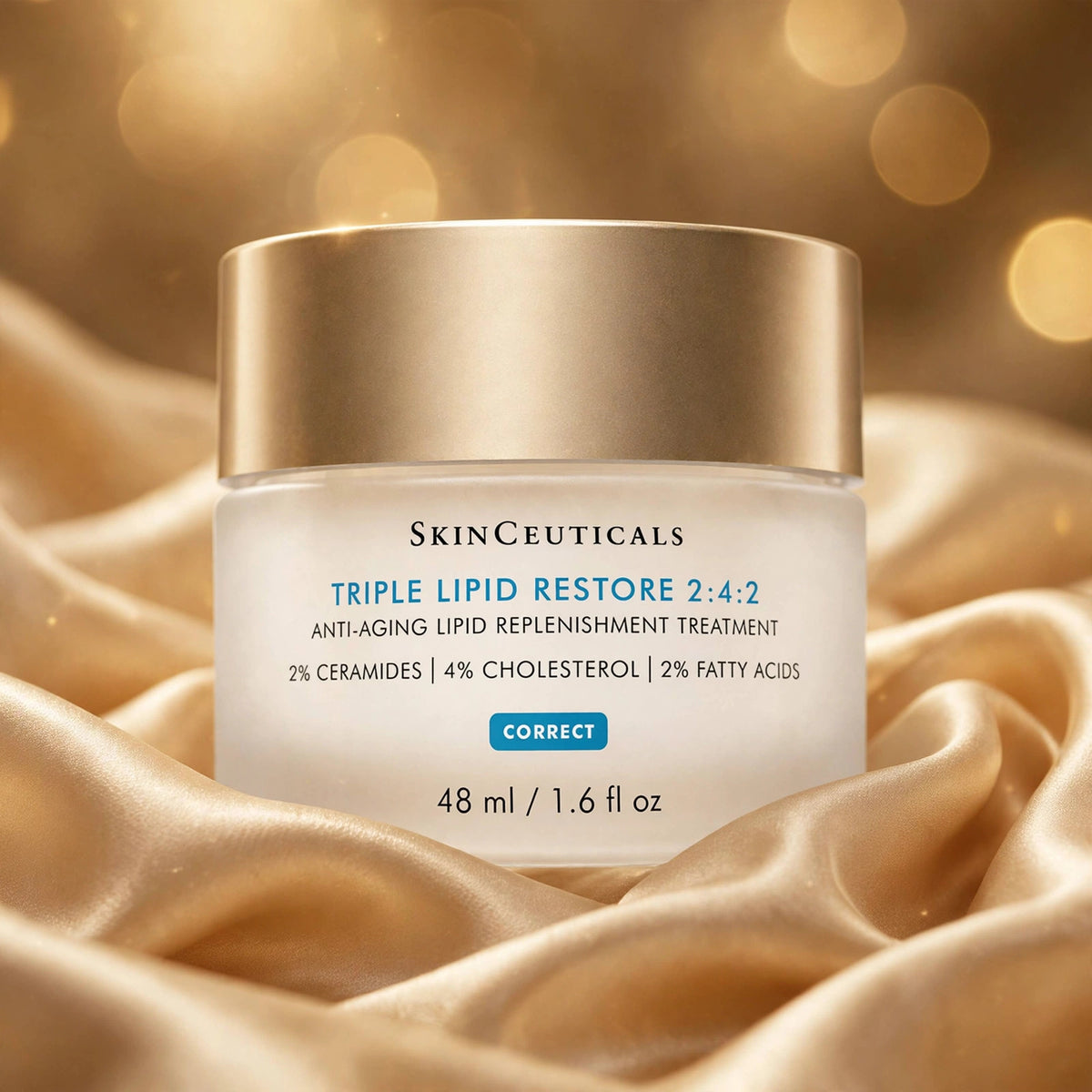 SkinCeuticals Triple Lipid Restore 2:4:2 48ml — product on champagne silk fabric