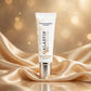 Alastin HydraTint Pro Mineral Sunscreen SPF 36 on champagne-gold silk fabric with golden bokeh