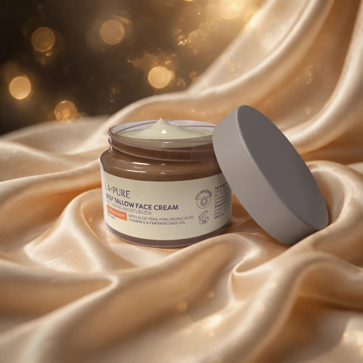 LA+ Pure Beef Tallow Face Cream 4oz — product on champagne silk fabric