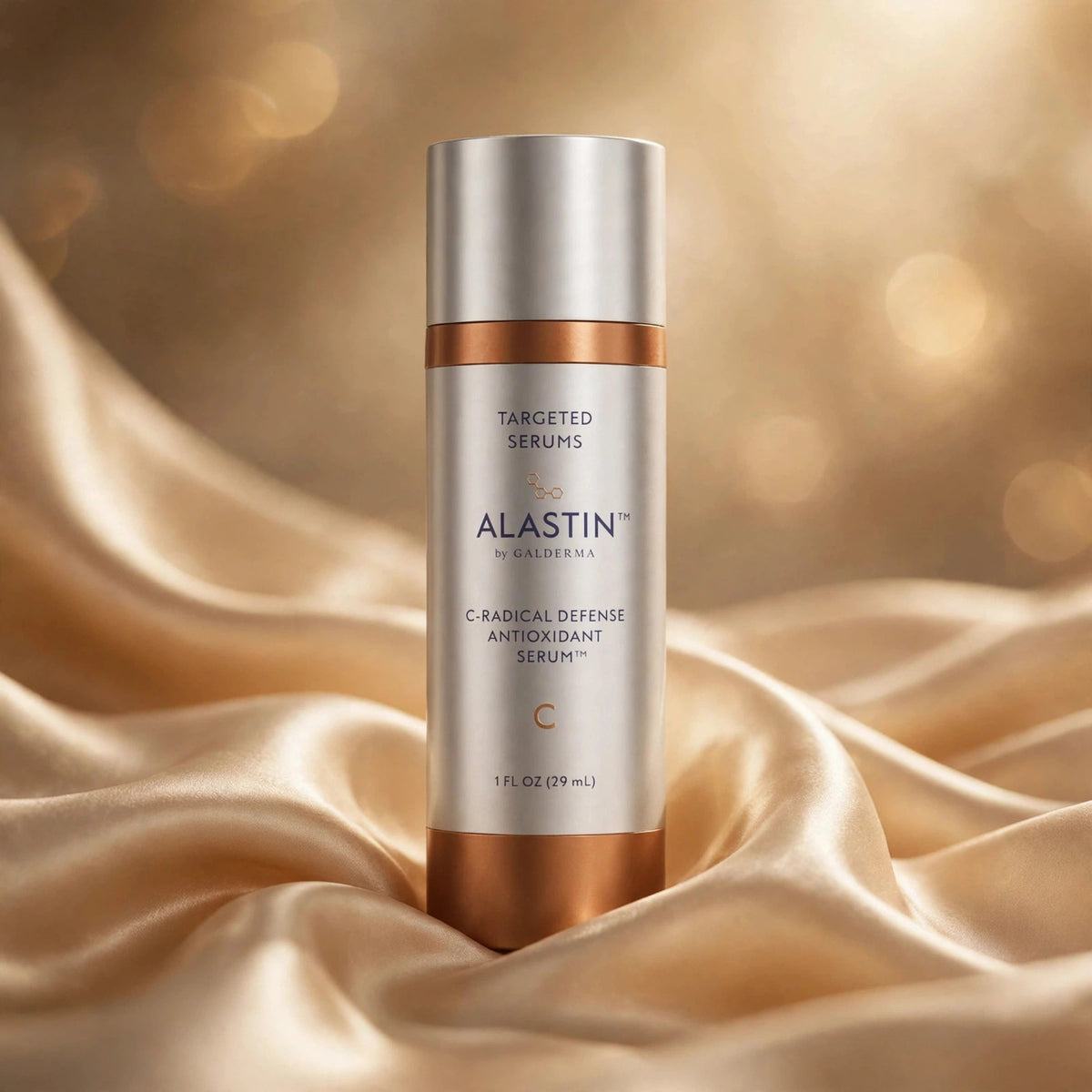 Alastin C-Radical Defense Antioxidant Serum 29.6ml — product on champagne silk fabric