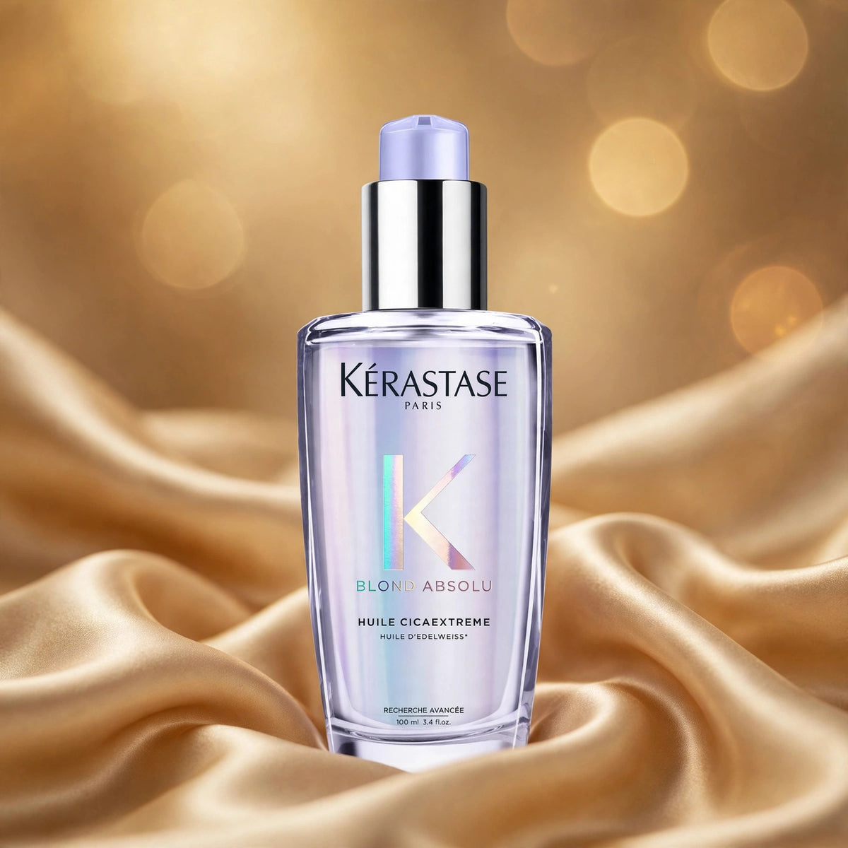 Kérastase Blond Absolu Huile Cicaextreme 100ml — product on champagne silk fabric
