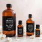 Hotel Collection Aroma 360 Essential Oil 500ml — product with white orchids in spa setting