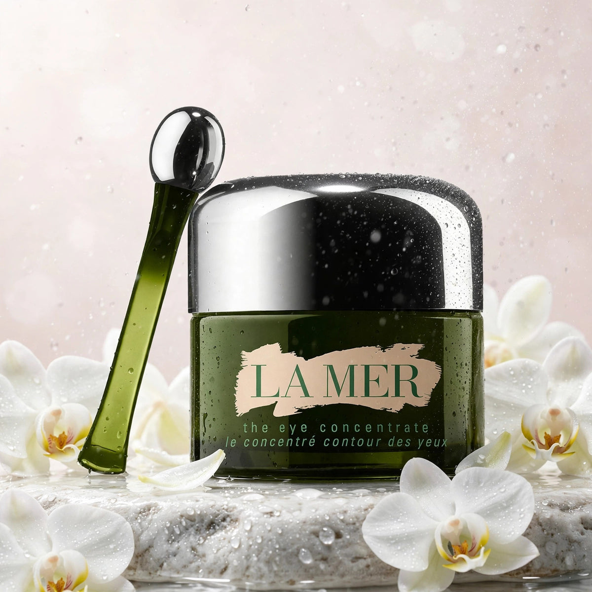 La Mer The Eye Concentrate 15ml — product with white orchids in spa setting