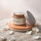 LA+ Pure Beef Tallow Face Cream 4oz — product with white orchids in spa setting
