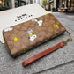COACH x PEANUTS Long Zip around Wallet Snoopy Woodstock Khaki Signatur - street