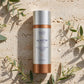 Alastin C-Radical Defense Antioxidant Serum 29.6ml — product on travertine stone with eucalyptus