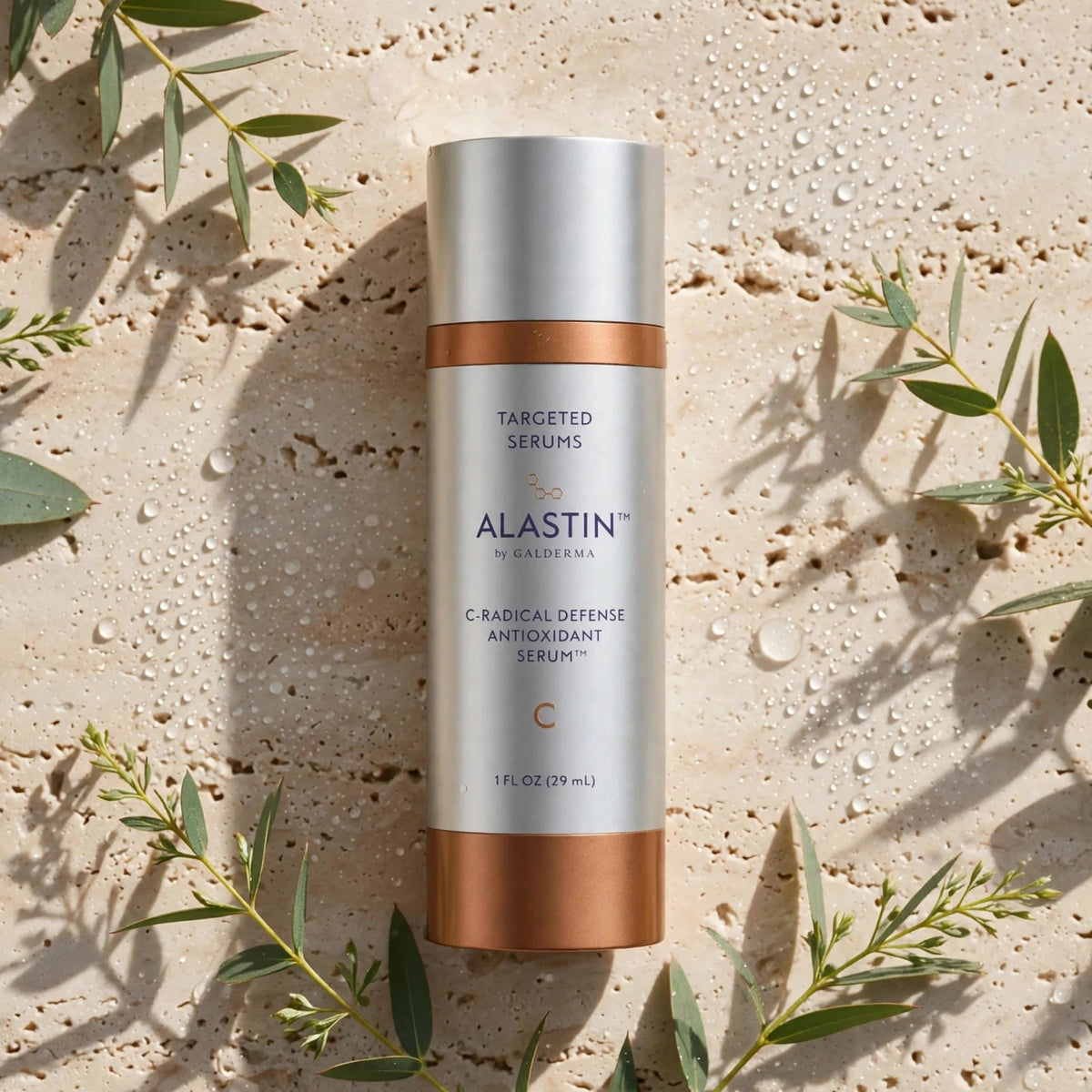 Alastin C-Radical Defense Antioxidant Serum 29.6ml — product on travertine stone with eucalyptus
